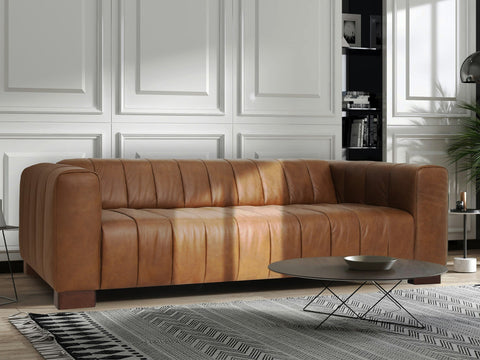 Midcentury Modern Leather Sofas in Toronto , stylish and timeless brown sofa in a modern living room setting.