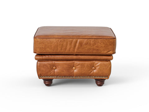 Front view of the Stanhope Cognac Distressed Leather Chesterfield Ottoman showcasing luxurious top-grain leather and button detailing.
