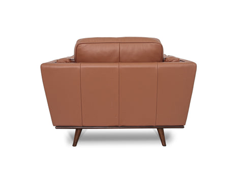Selina Midcentury Brown Leather Accent Chair shown from the back, showcasing its sleek design and luxurious leather upholstery.