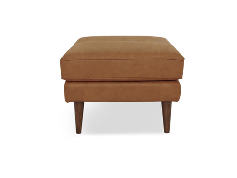 Selina Midcentury Tan Leather Ottoman in premium full top-grain leather showcasing timeless craftsmanship and sophisticated design.