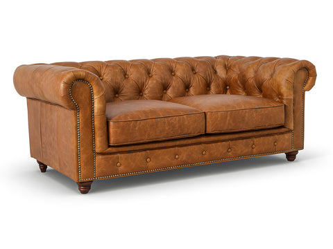 Stanhope Cognac Distressed Leather Loveseat Chesterfield with tufted back and classic design, showcasing luxurious aniline leather finish.