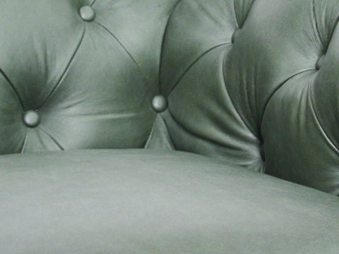 Close-up of Stanhope Royal Green Leather 4 Seater Chesterfield showcasing rich top-grain aniline leather and tufted design.