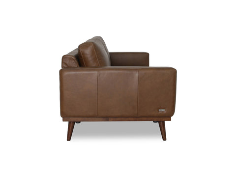 Amore Midcentury Chestnut Brown Leather 3 seater sofa side view showcasing rich leather and tapered teak oak legs.