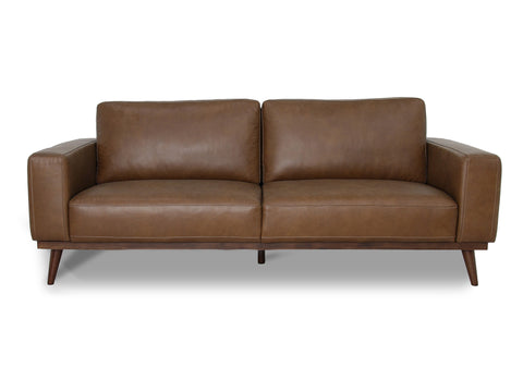 Amore Midcentury Chestnut Brown Leather 3 seater sofa with plush cushions and teak oak legs, ideal for contemporary living spaces.