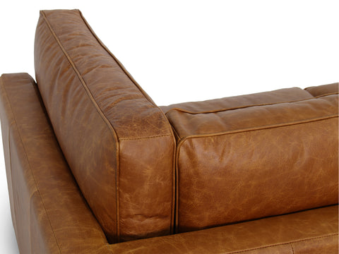 Eleganza Cognac Distressed Leather 3 Seater Sofa with plush cushions and walnut legs, showcasing luxurious top aniline leather.