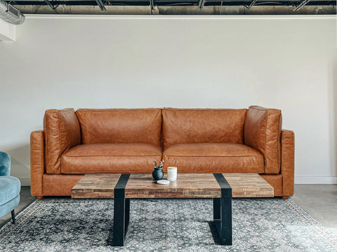 Eleganza Cognac Distressed Leather 3 Seater Sofa with plush cushions and walnut legs in a modern living room setting.