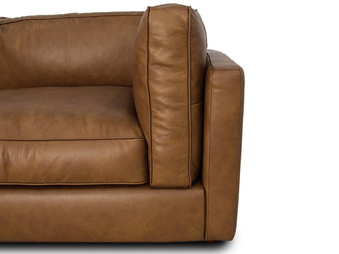 Eleganza Tan Distressed Leather 3 Seater Sofa side view showcasing its luxurious leather upholstery.
