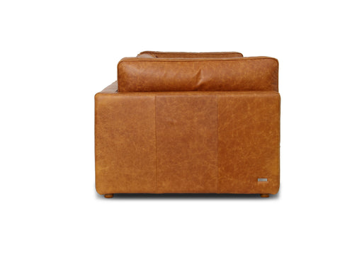 Side view of Eleganza Cognac Distressed Leather 3 Seater Sofa featuring luxurious aniline leather and walnut wood legs