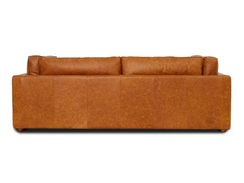 Back view of Eleganza Cognac Distressed Leather 3 Seater Sofa with walnut wood legs