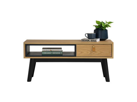 Lia Mid-Century Modern Oak Coffee Table with Drawer showcasing Nordic design, black legs, and leather loop detail.