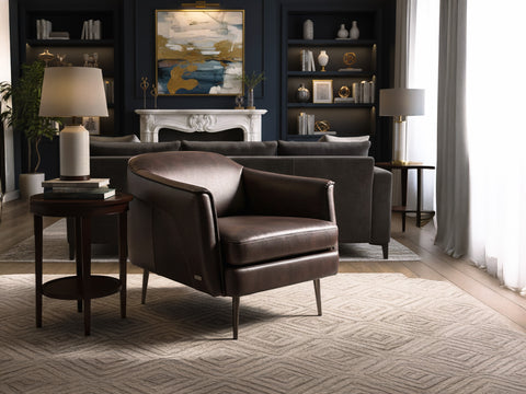 Lusso Vintage brown leather lounge chair in a stylish living room setting with modern decor.
