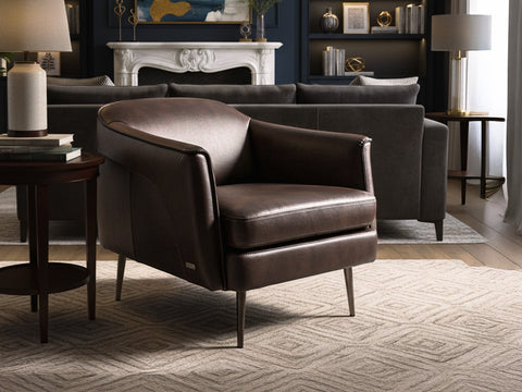 Lusso Vintage brown leather lounge chair in a stylish living room setting with modern decor.