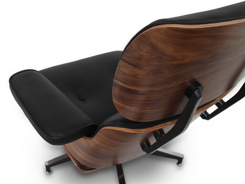 Meseo Black Leather Lounge Chair and Ottoman with sleek wood and black leather upholstery.