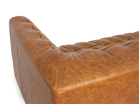 Nova Russet Brown 3 Seater Distressed Leather Sofa corner view with deep button tufting and sleek silhouette.