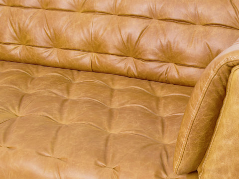 Nova Camel Brown Distressed leather 3 Seater sofa showcasing deep button tufting and luxurious leather texture.