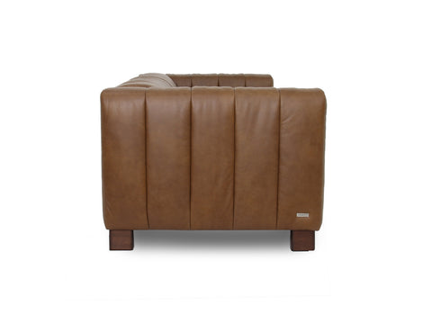 Portfino Vintage Brown Channel tufted leather sofa side view showcasing channel tufting and rich leather texture.