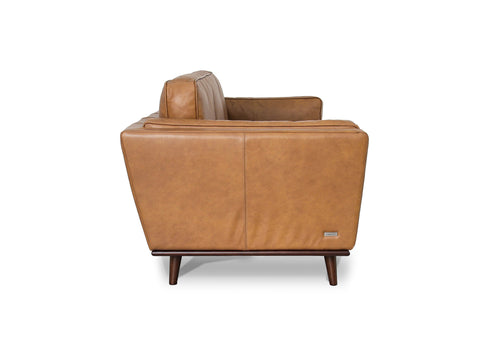 Side view of Selina Midcentury Tan Leather 3 Seater Sofa showcasing its sleek design and soft leather finish.
