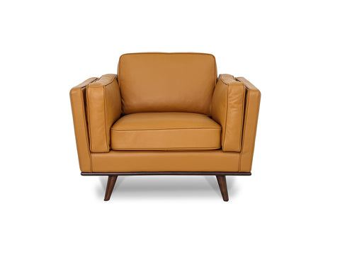 Selina Midcentury Cognac Leather Accent Chair featuring a structured design and warm cognac leather upholstery.