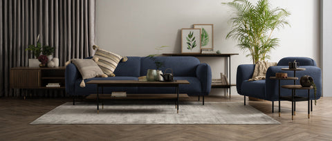 Luxana Home living room showcasing the best furniture for small spaces with a cozy sofa, armchair, and practical coffee table.