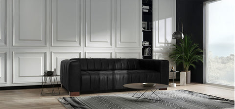 Upgrade Your Home With Your Tax Refund: Modern black sofa in stylish living room for Canadian home upgrades.