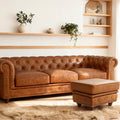 Stanhope Cognac Distressed Leather Chesterfield Ottoman in elegant living room setting.