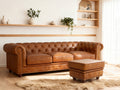 Stanhope Cognac Distressed Leather Chesterfield Ottoman in elegant living room setting.
