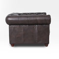 Side view of Stanhope Dark Chocolate 1 Seater Chesterfield in aniline leather highlighting rich texture and luxurious design.