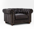 Stanhope Dark Chocolate 1 Seater Chesterfield upholstered in rich aniline leather with classic tufted design, showcasing modern luxury.