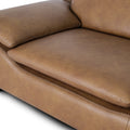 Close-up of Milano Tan Leather Sectional Sofa - Right Chaise showcasing premium full-grain leather texture and sleek design.