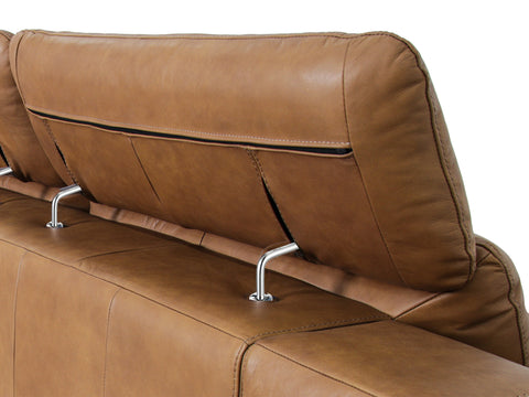 Close-up of headrest detail on Milano Tan Leather Sectional Sofa - Right Chaise, showcasing high-quality leather and modern design.