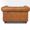 Back view of Stanhope Cognac Distressed Leather 1 Seater Chesterfield showcasing rich aniline leather and elegant craftsmanship.