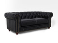 Stanhope Black Loveseat Chesterfield in top-grain leather with tufted back and brass nailhead trim.