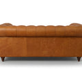 Stanhope Cognac Distressed Leather Loveseat Chesterfield, back view showing luxurious aniline leather upholstery.