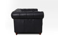 Side view of Stanhope Black Loveseat Chesterfield in rich top-grain aniline leather, highlighting British heritage style.