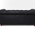 Back view of the Stanhope Black Loveseat Chesterfield in rich leather, showcasing its elegant design.