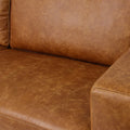 Close-up of Amore Cognac Distressed Leather 3 seater sofa showcasing top-grain leather with matte finish.