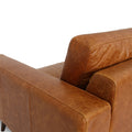 Side view of Amore Cognac Distressed Leather 3 seater sofa with modern craftsmanship and teak oak legs