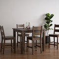 Annata Rustic Counter Table - Dark Solid Wood in cozy dining setting