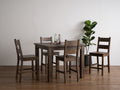 Annata Rustic Counter Table - Dark Solid Wood in cozy dining setting