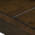 Close-up of Annata Rustic Dining Table - Dark Solid Wood corner showcasing rich wood grain texture.