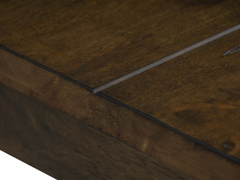 Close-up of Annata Rustic Dining Table - Dark Solid Wood corner showcasing rich wood grain texture.