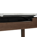 Caldo Extendable dining table showing the extension mechanism and marble-look laminate top.