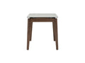 Caldo Extendable dining table with white marble-look top and cocoa-colored oak legs, designed for modern dining spaces.