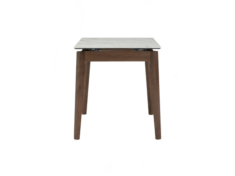 Caldo Extendable dining table with white marble-look top and cocoa-colored oak legs, designed for modern dining spaces.