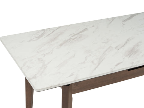 Close-up view of the Caldo Extendable dining table with a white marble-look laminate top and cocoa oak legs.