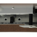 Close-up of the mechanism for the Caldo Extendable dining table's extension feature.
