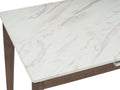 Caldo Extendable dining table with white marble-look high-pressure laminate top and cocoa-colored oak legs.