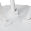 Camilla White Tripod Side Table with solid Oakaia Wood legs detail view.