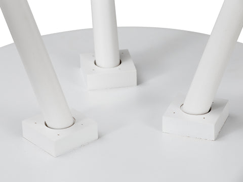 Camilla White Tripod Side Table with solid Oakaia Wood legs detail view.