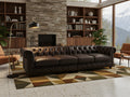 Stanhope Dark Chocolate 4 Seater Chesterfield in modern living room with stone fireplace and large windows